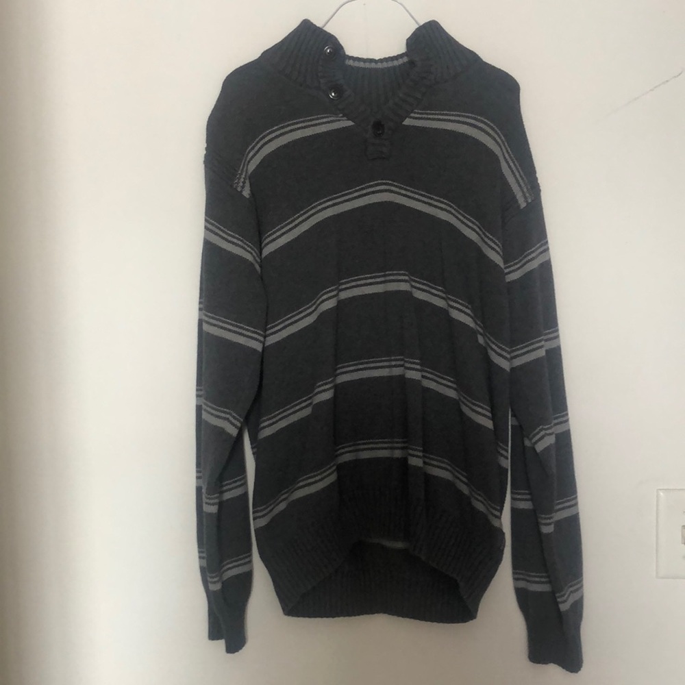 Grey and white stripped sweater.